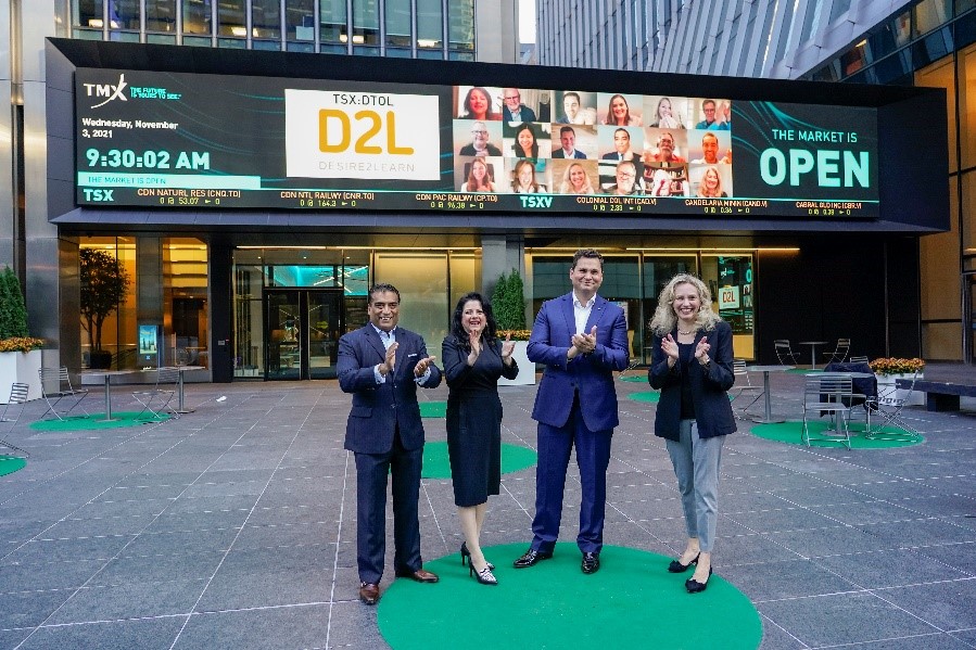The D2L team celebrating the company going public