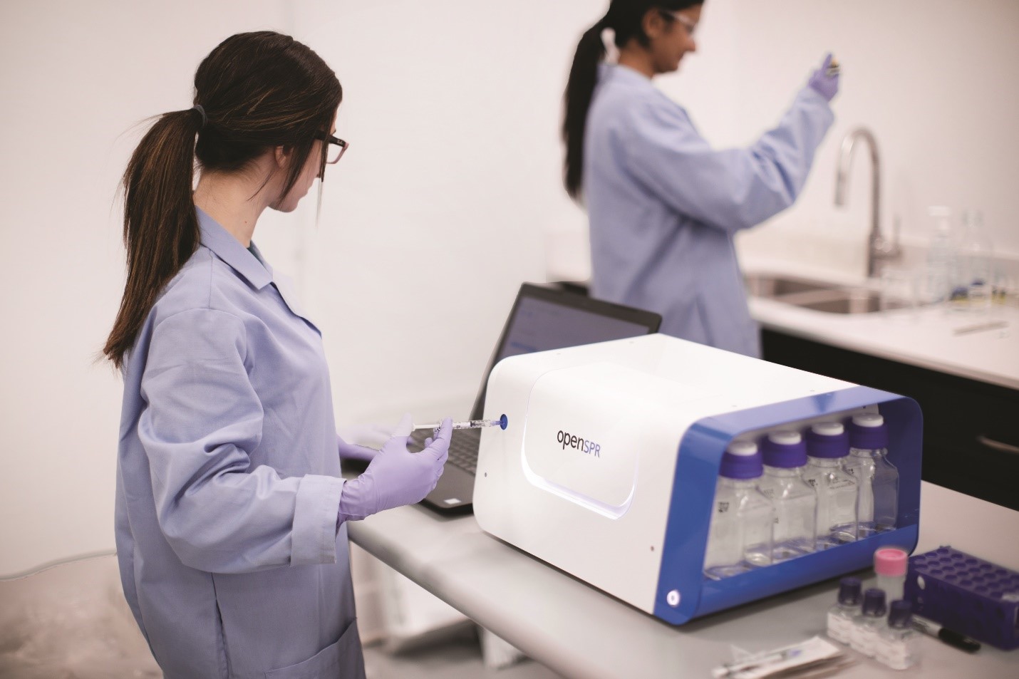 Scientist uses the Nicoya OpenSPR-2 instrument to analyze protein interactions